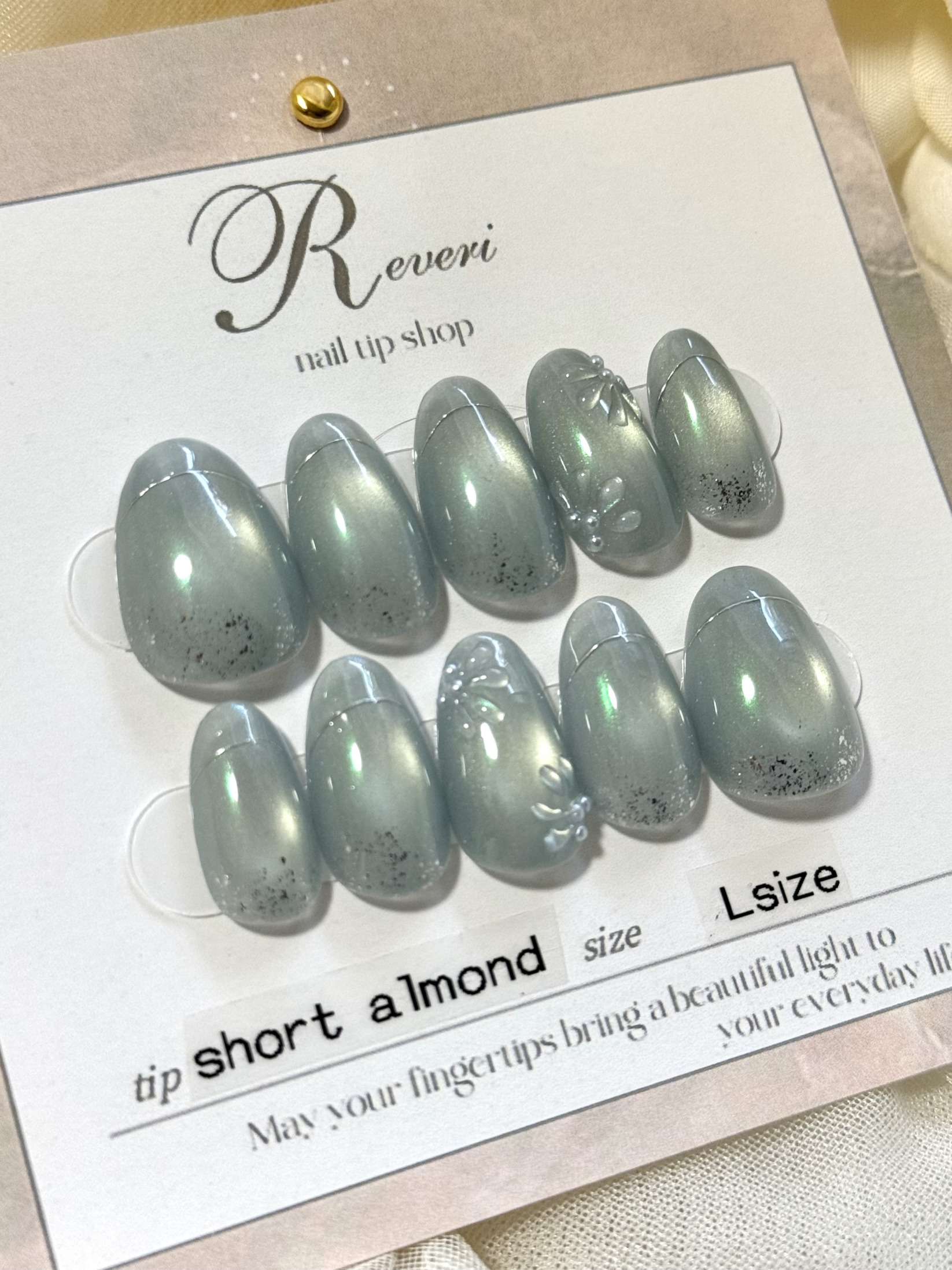 水色マグネットのお花ネイルチップ